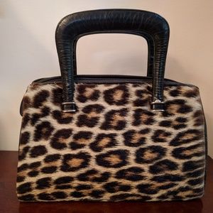 Authentic vintage leopard fur handbag circa 1950.